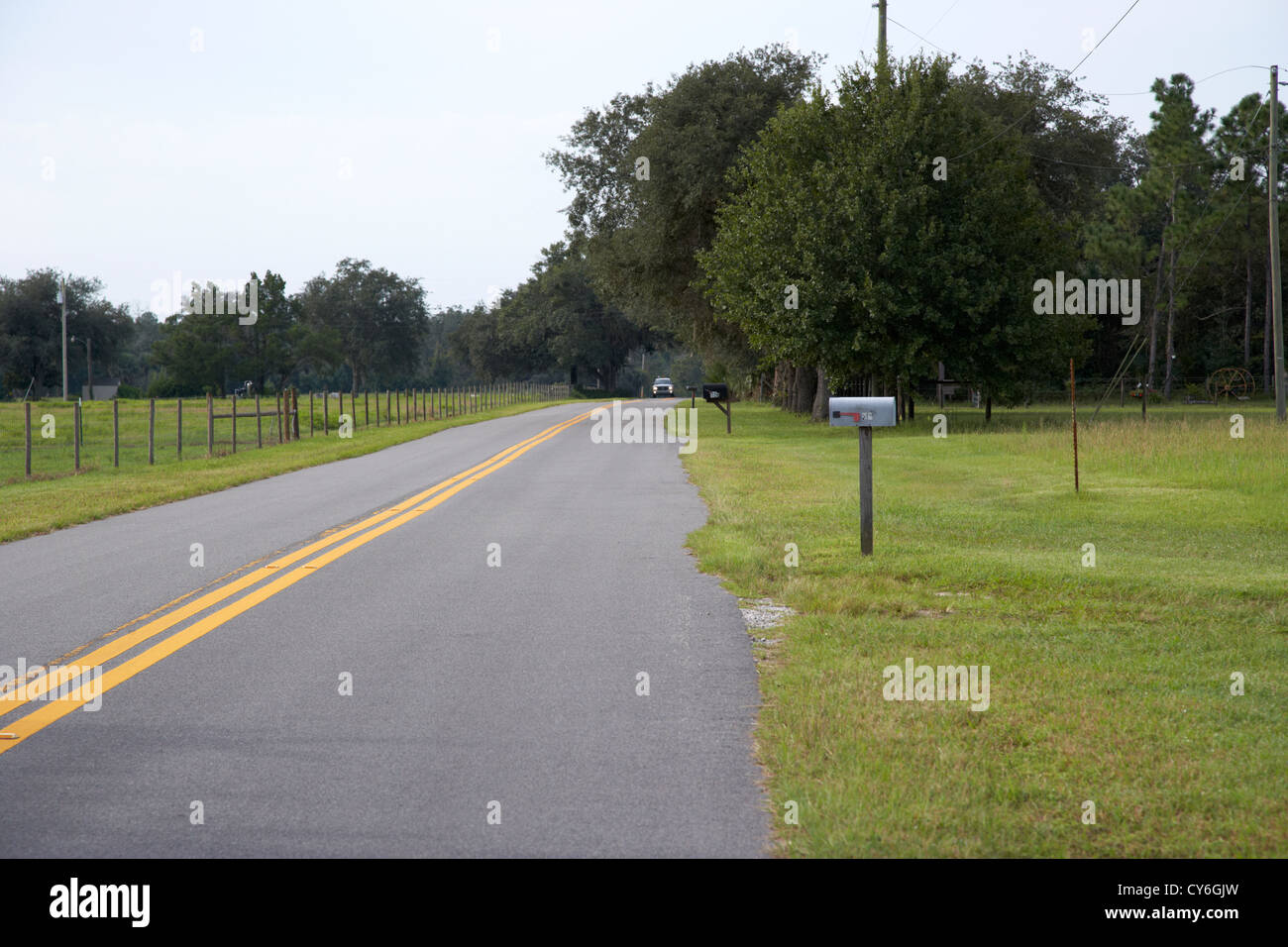 mailboxes on a small rural road florida usa Stock Photo