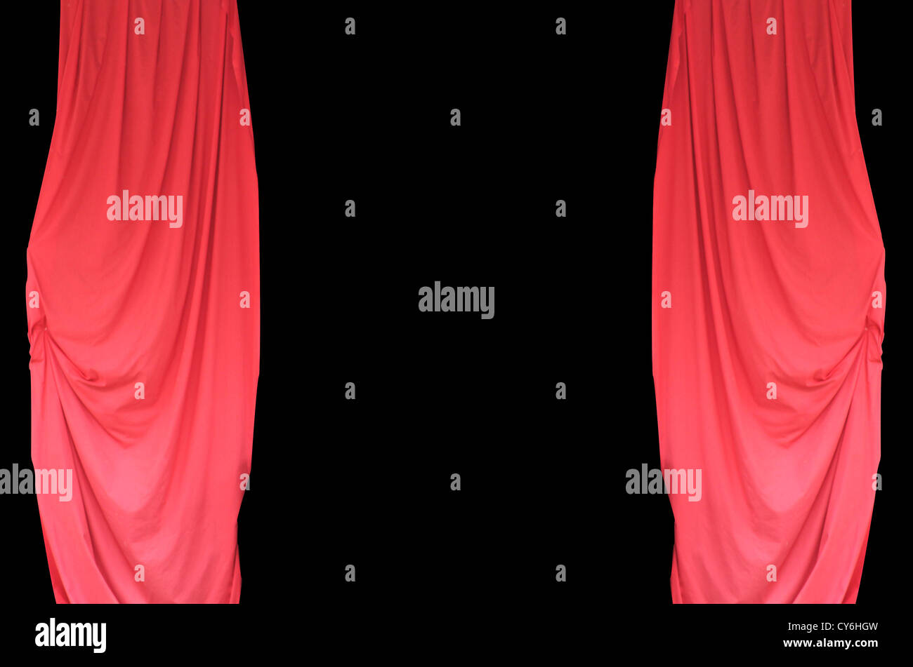 Open red stage theater curtains with black background and copy space. Stock Photo
