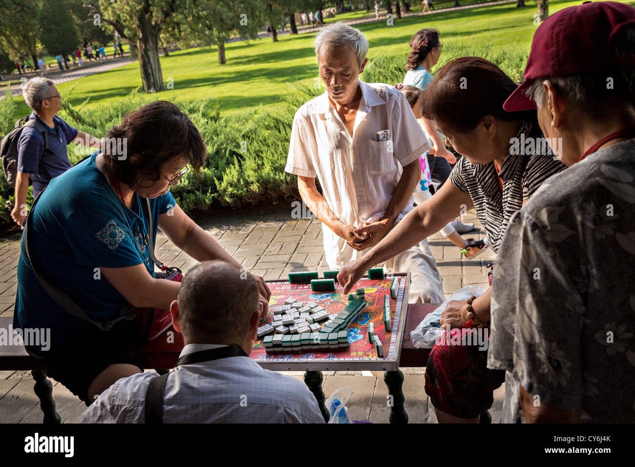 Chinese people play mahjong a traditional board game at the Temple of  Heaven Park in Beijing, China Stock Photo - Alamy