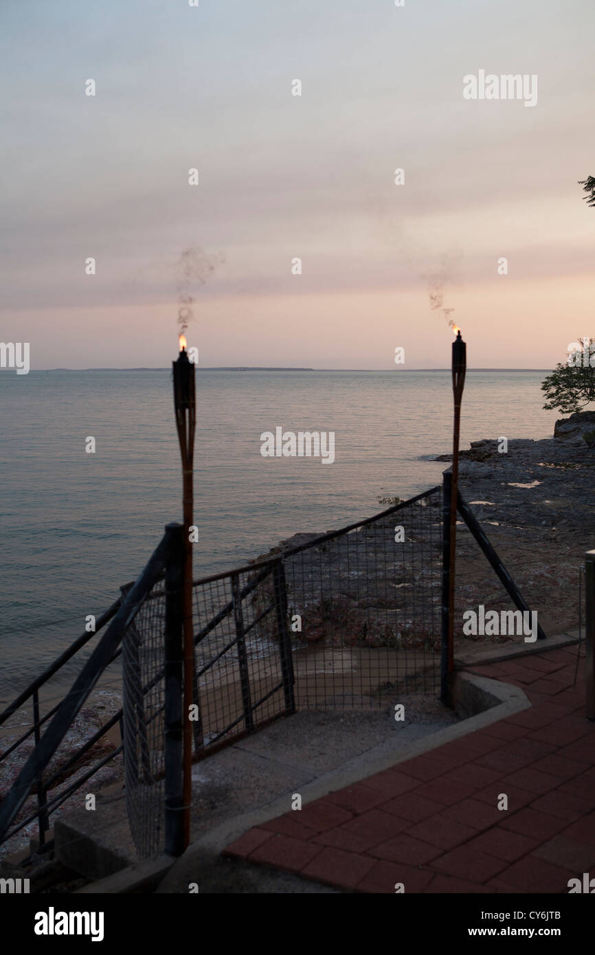 Flaming torches outside Peewees restaurant and bar in Darwin, Northern