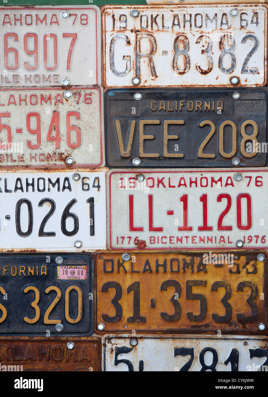 A background made of vintage automobile license plates Stock Photo