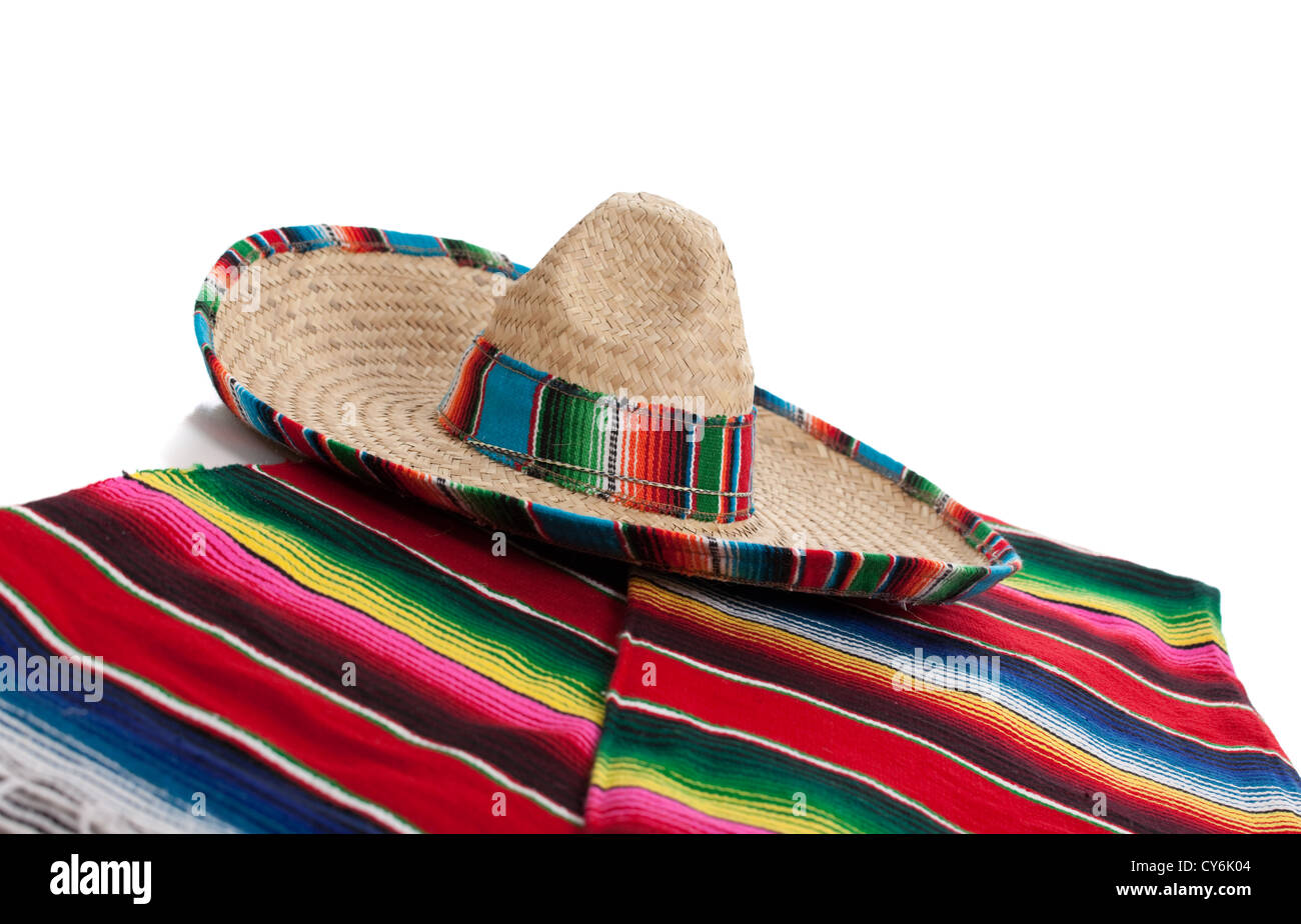 Mexican Serape blanket and sombrero on a white background Stock Photo