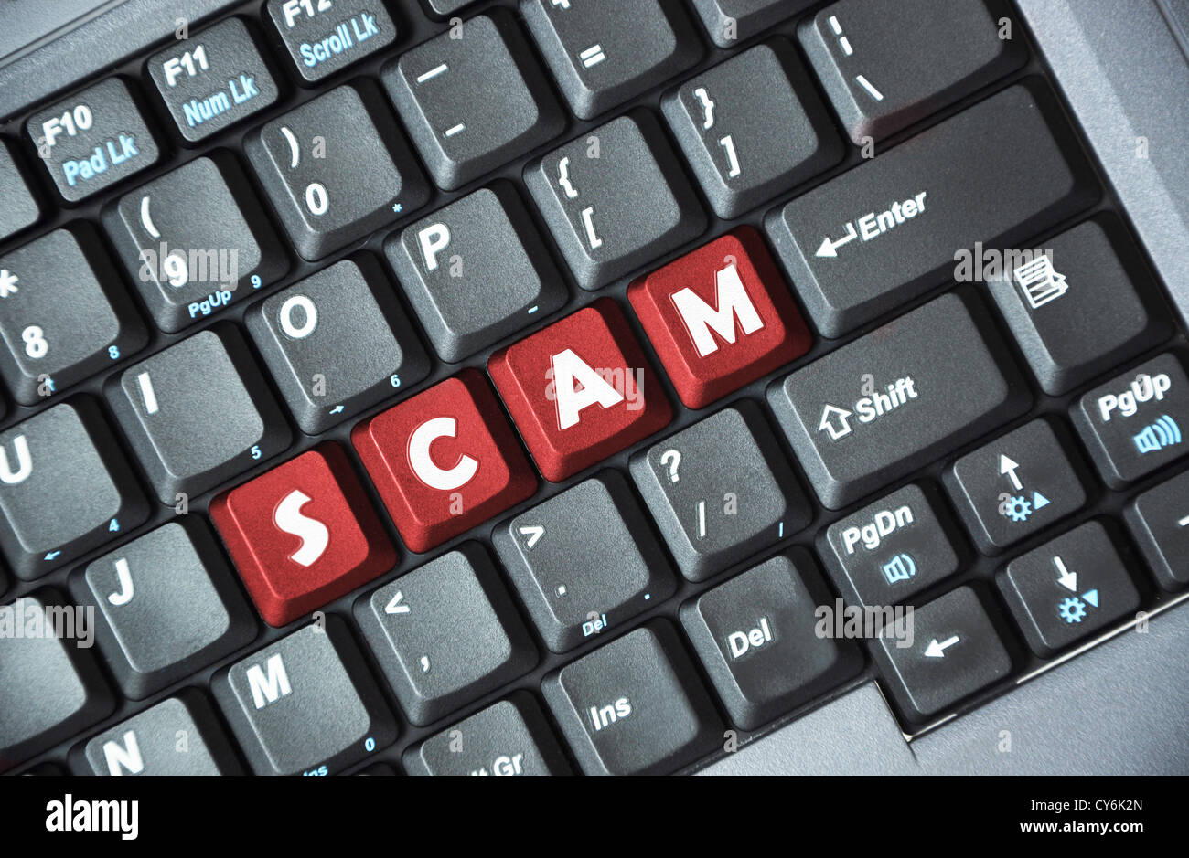 Scam on keyboard Stock Photo