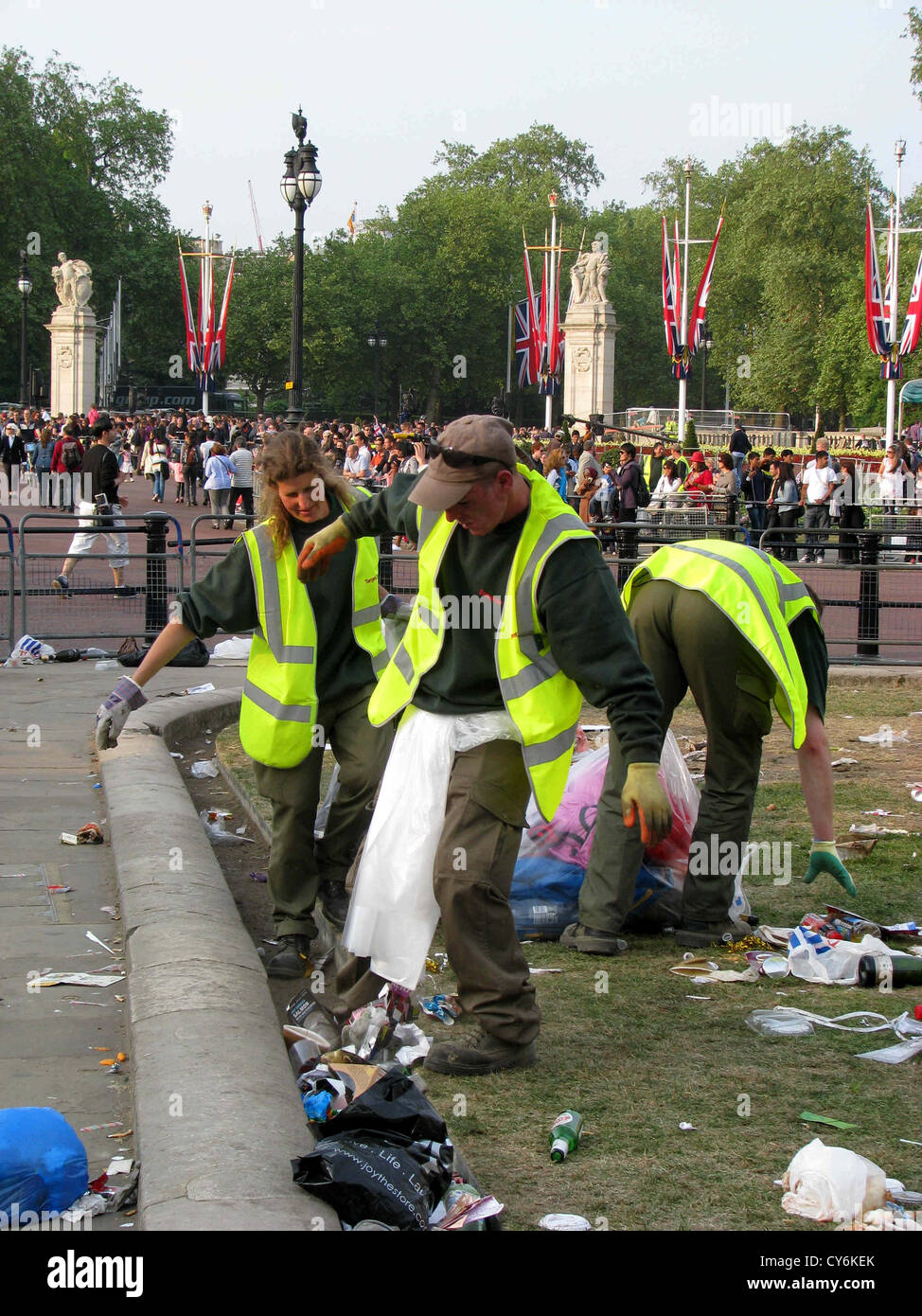 RUBBISH COLLECTORS PICKING UP RUBBISH AND LITTER OUTSIDE BUCKINGHAM