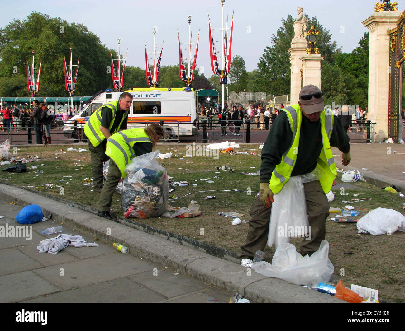 RUBBISH COLLECTORS PICKING UP RUBBISH AND LITTER OUTSIDE BUCKINGHAM