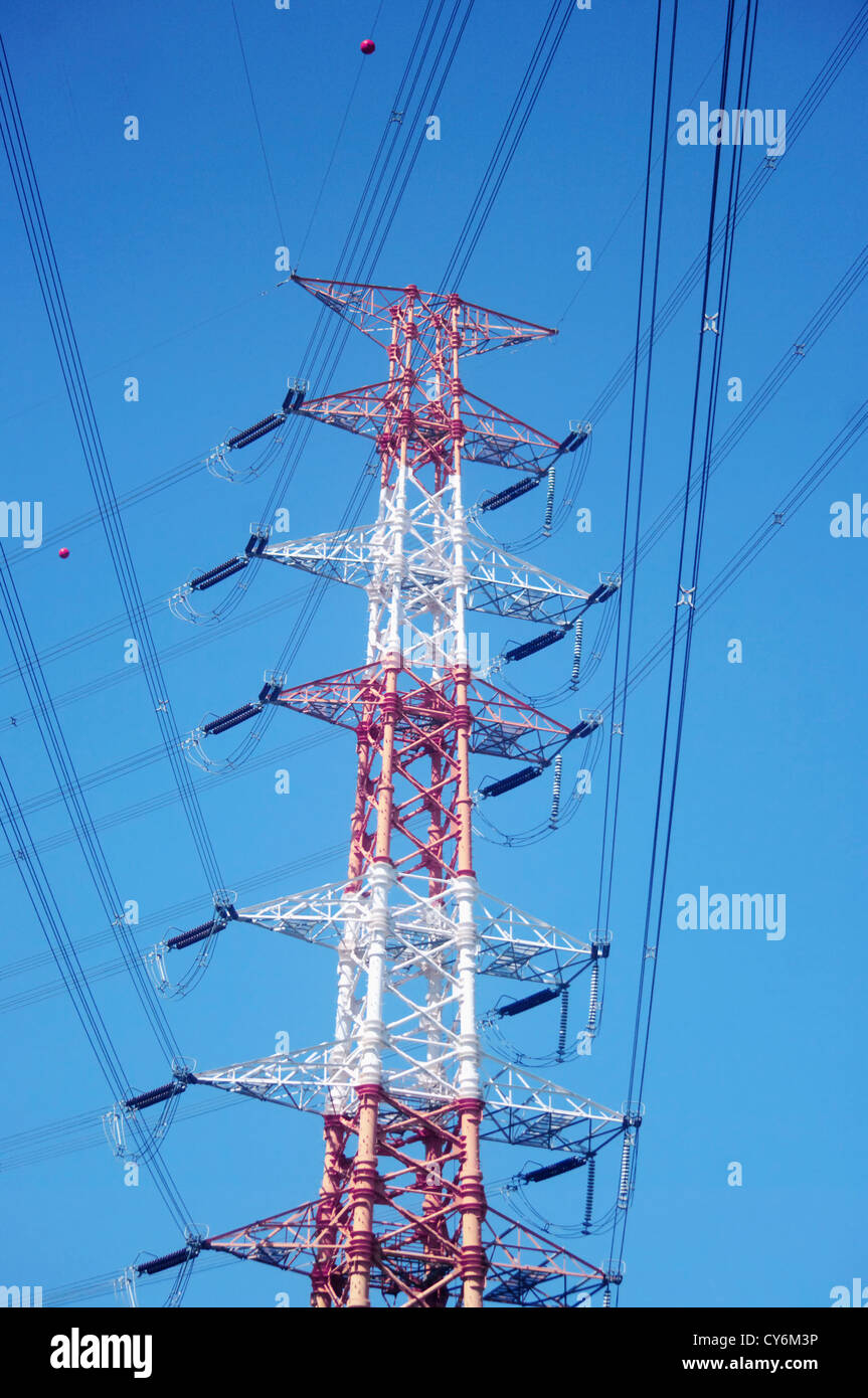 High-voltage electric reliance on background of blue sky Stock Photo