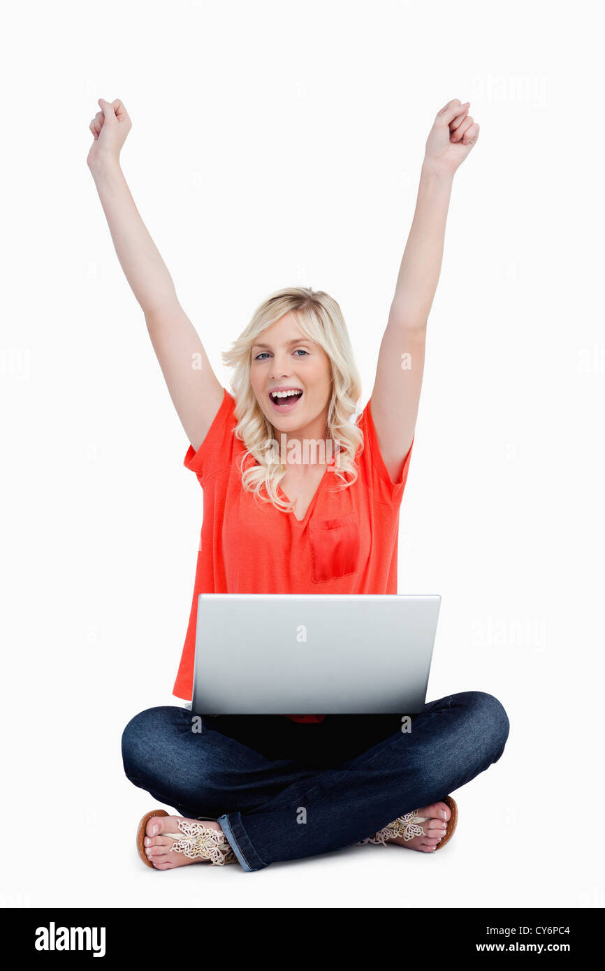 Girl sitting arms legs crossed hi-res stock photography and images - Alamy