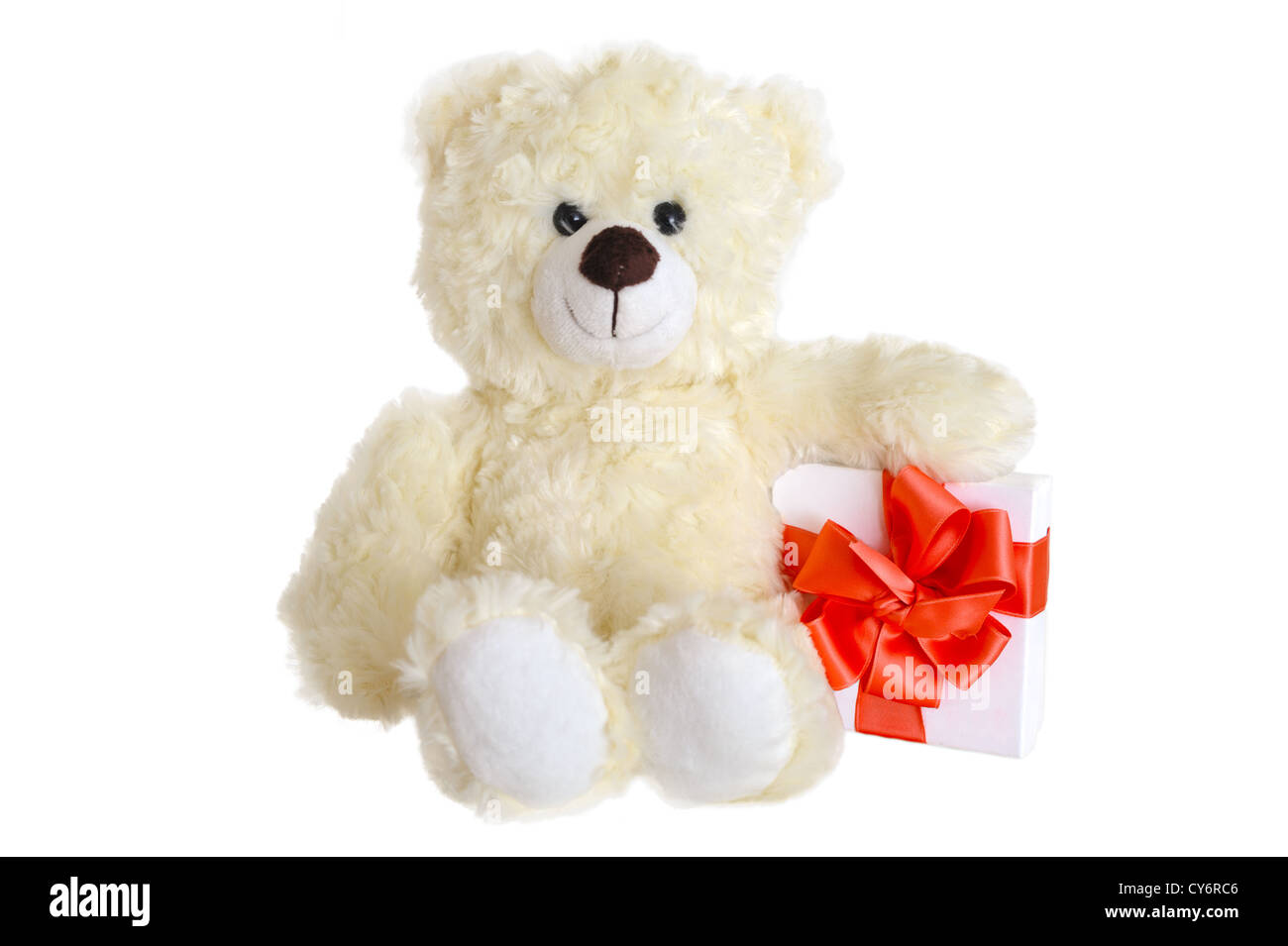 White teddy bear with present box and tied with the red ribbon Stock ...