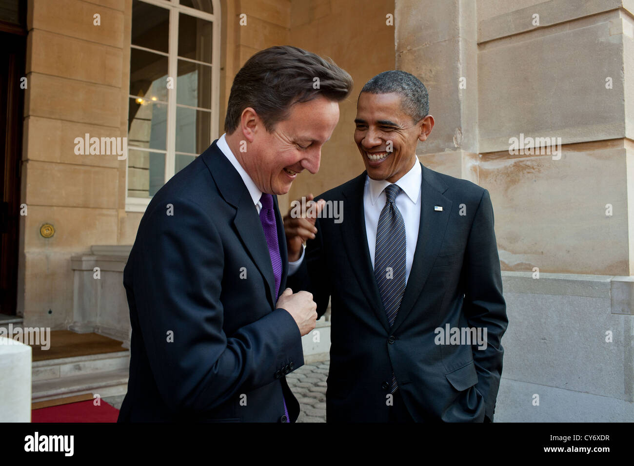 US President Barack Obama talks with British Prime Minister David Cameron following their joint press conference at Lancaster House May 25, 2011 in London, England. Stock Photo