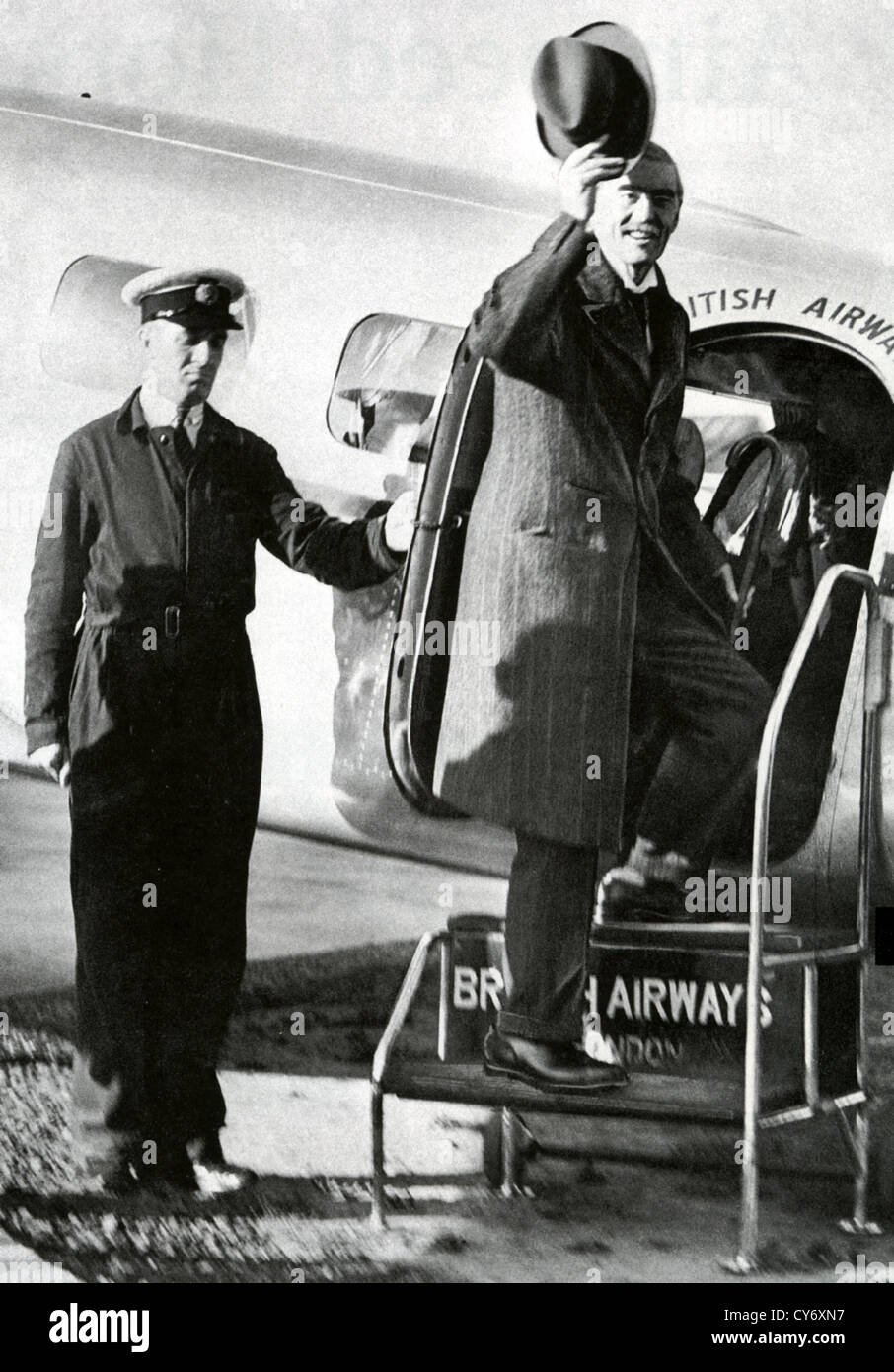NEVILLE CHAMBERLAIN (1869-1940) boarding his plane for the flight to Munich on 15 September 1938 to meet Adolf Hitler Stock Photo