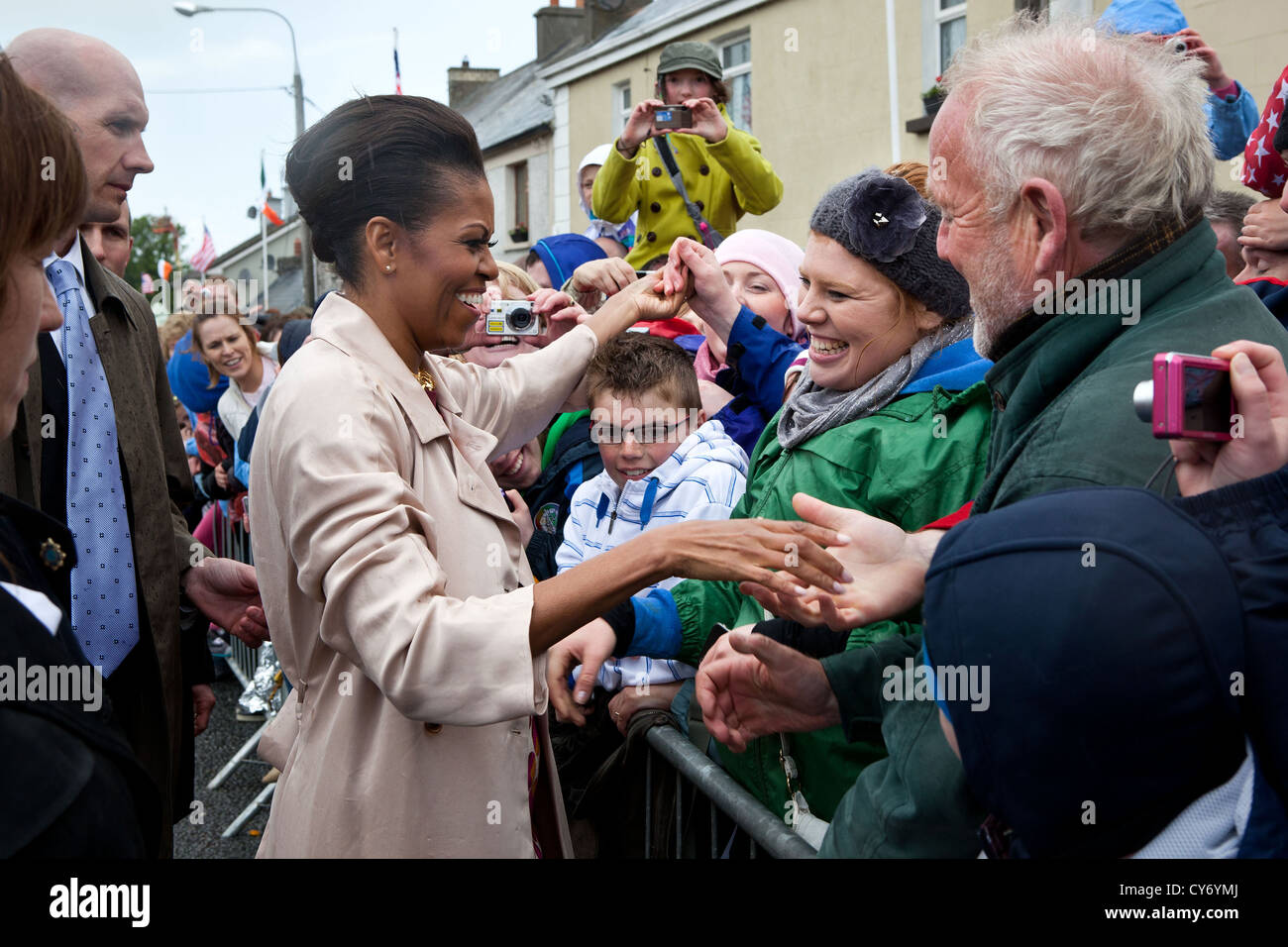 First Lady Michelle Obama greets people on Main Street May 23, 2011 in Moneygall, Ireland. Stock Photo