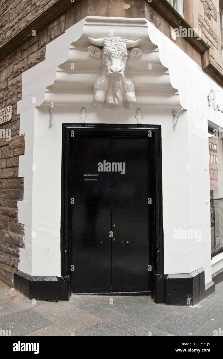 Bulls head above shop doorway. St Marys Street in central Edinburgh Stock Photo
