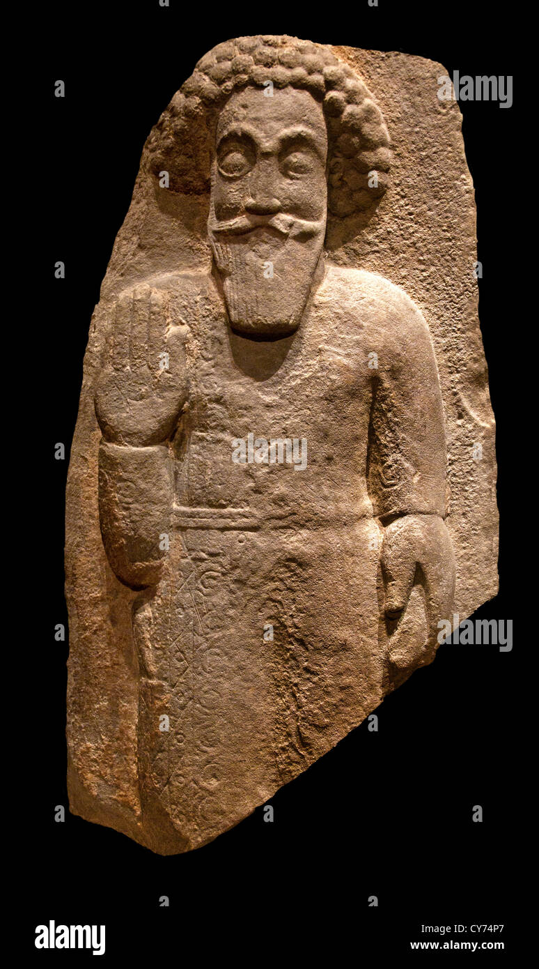 Standing man Iran -  Khuzestan ? Parthian ca. A.D. 2nd century  Southwestern Iran Basalt. 77 cm Stone Stock Photo