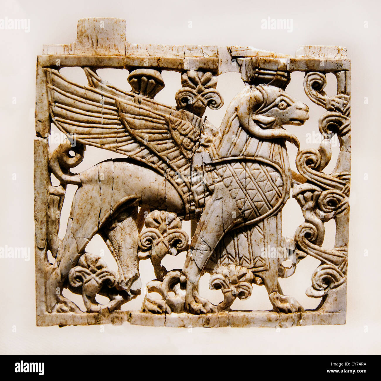 Openwork plaque with ram-headed sphinx  Neo Assyrian 9th–8th century B.C. Mesopotamia Nimrud ancient Kalhu Assyrian Ivory 8cm Stock Photo