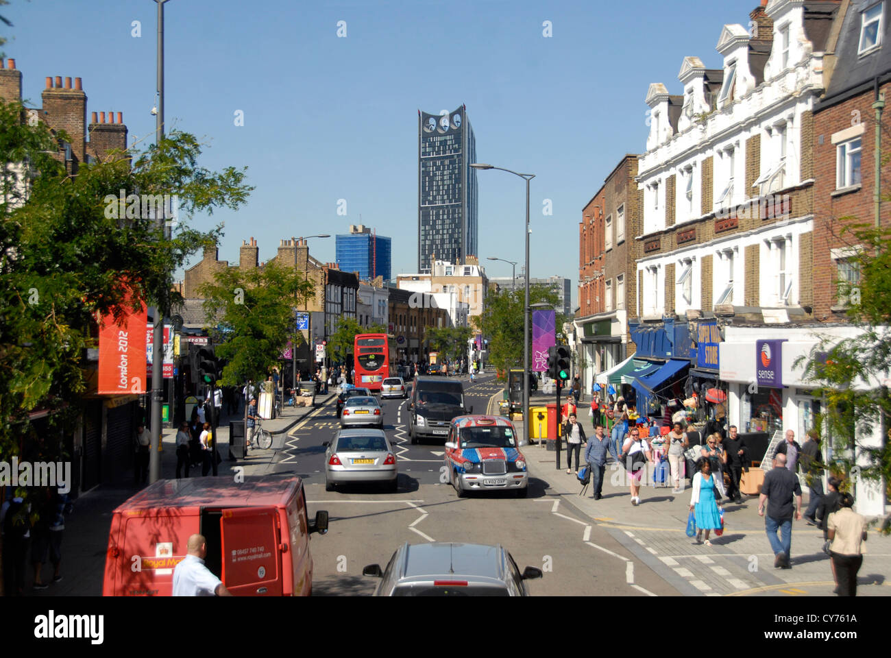 Street view in south east London with Strata Tower in distance London UK Stock Photo