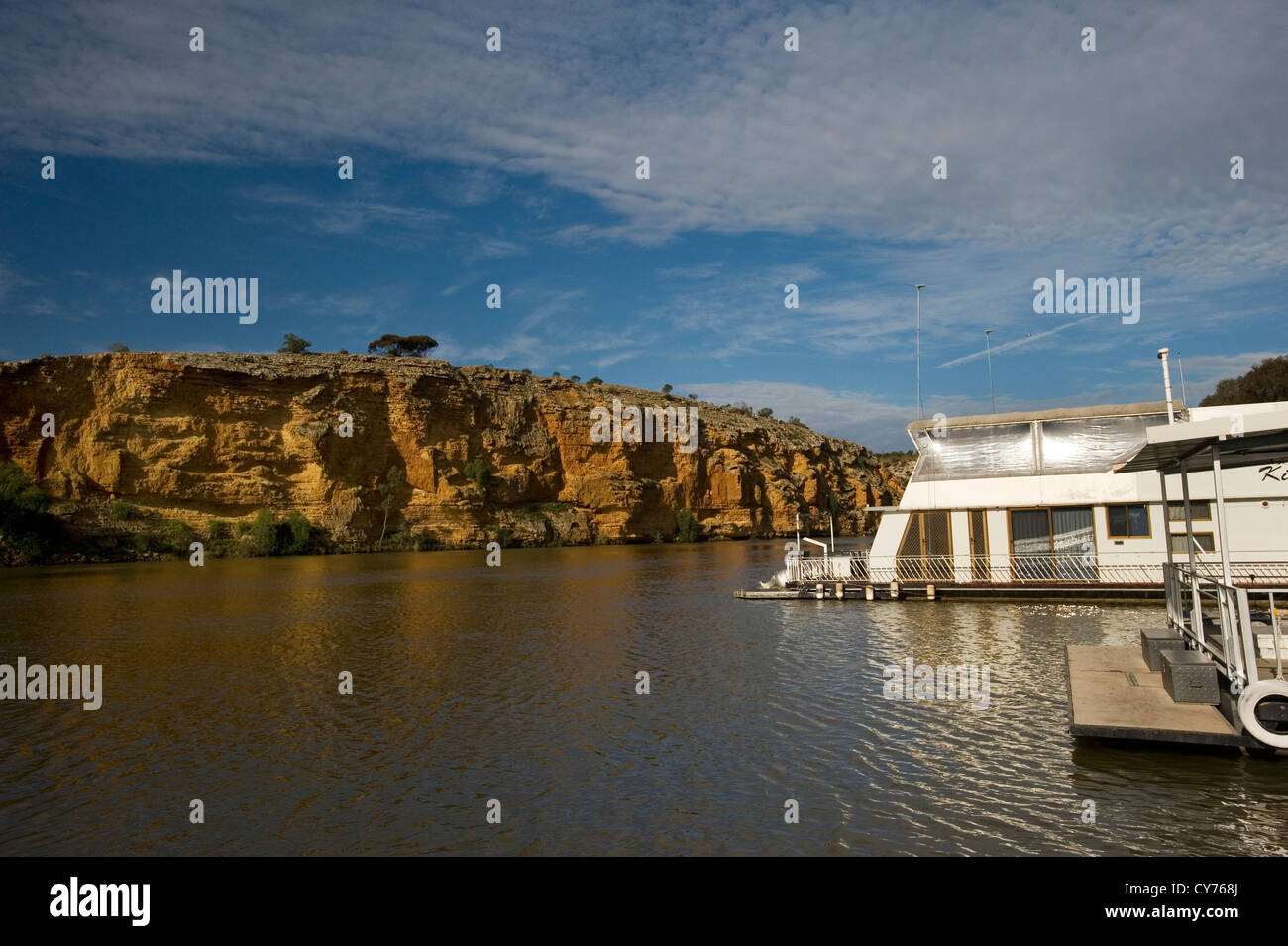 Murray River South Australia cliffs and riverboat houseboat Stock Photo