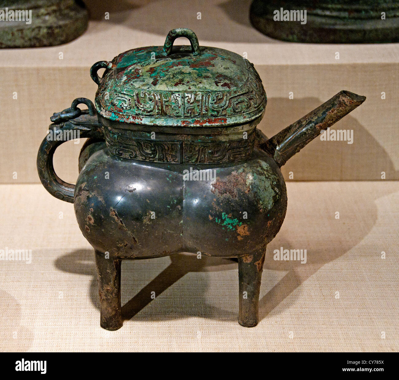 Covered Wine Vessel Yin Lingde Shang dynasty 1600 – 1046 B.C. Bronze with green patina 31 cm China Chinese Stock Photo