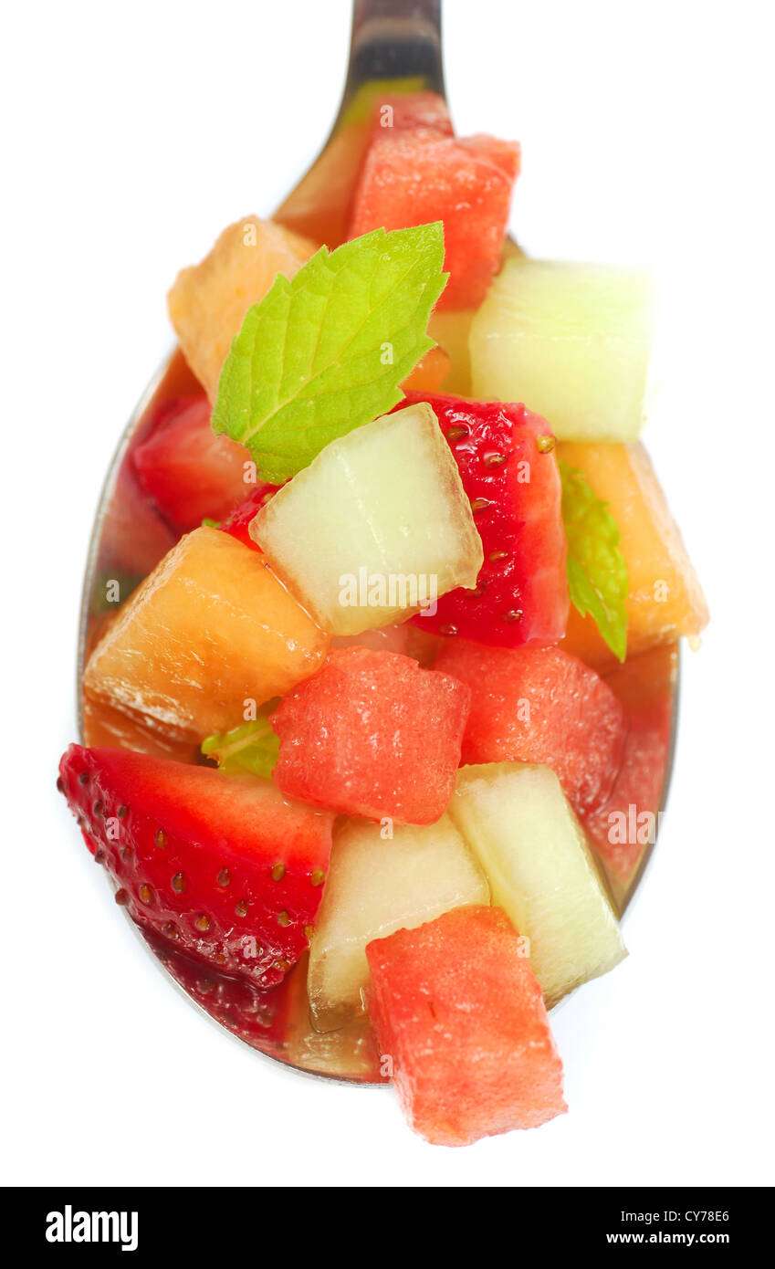 Fresh fruit salsa containing watermelon, orange, cantaloupe, strawberries, musk melon and mint Stock Photo