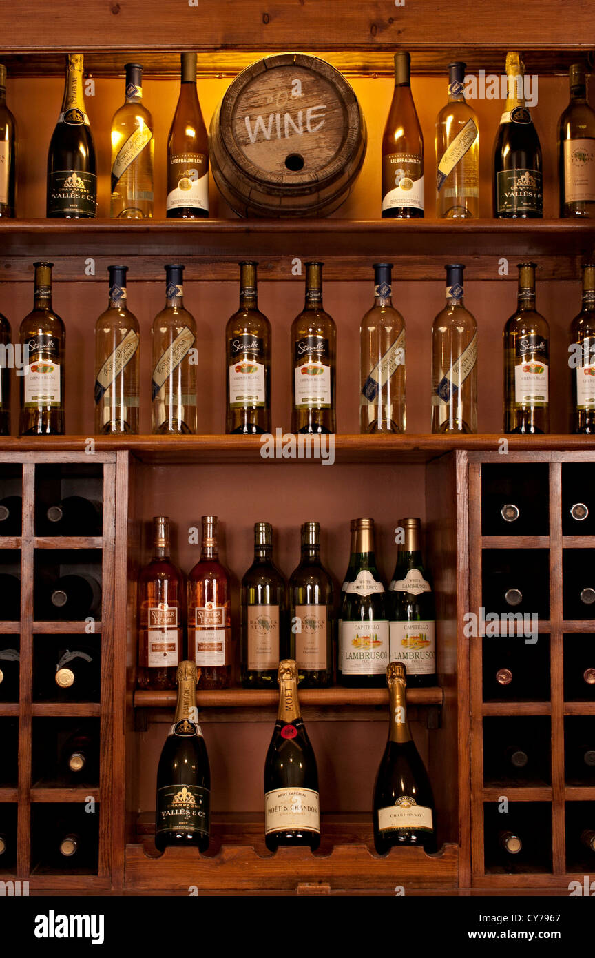 the mill wine whisky spirits bottles on shelf Stock Photo