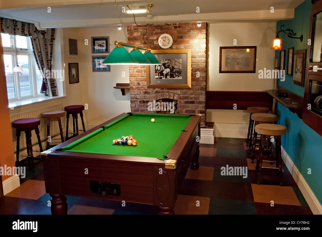 the new clock pub Pool table Stock Photo Alamy