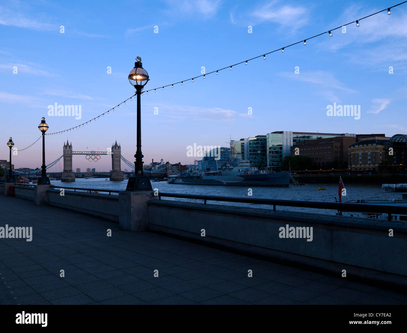 London Bridge and Olympic rings London Skyline at night England. Stock Photo