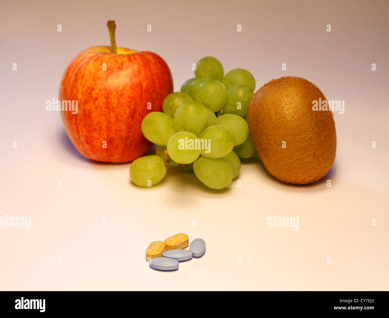 Fruits and tablets Stock Photo
