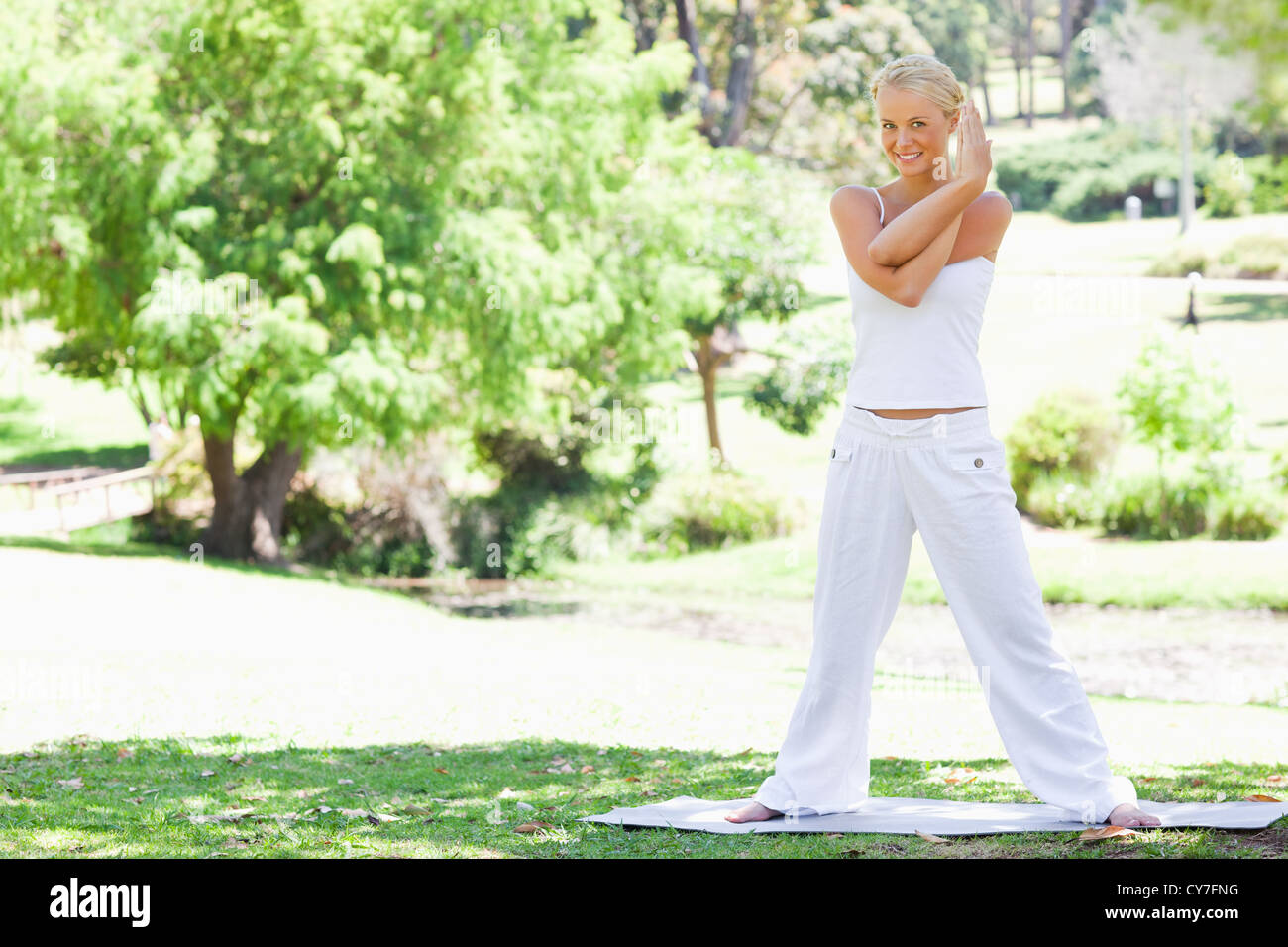 Young white woman stretches arms hi-res stock photography and images ...