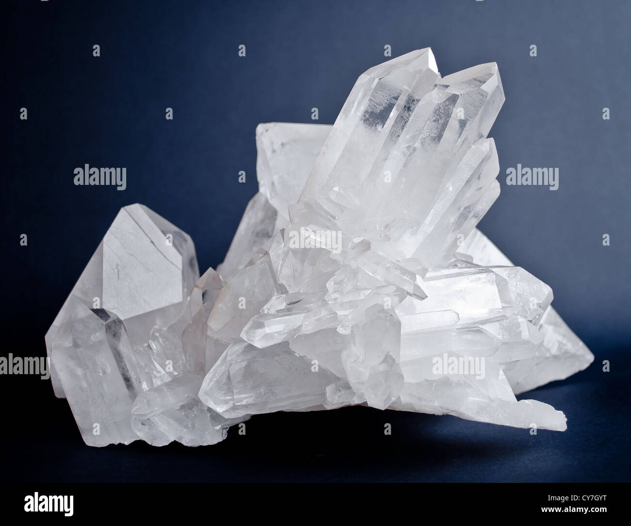 Large Crystals Of White Quartz On Dark Blue Background Stock Photo Alamy
