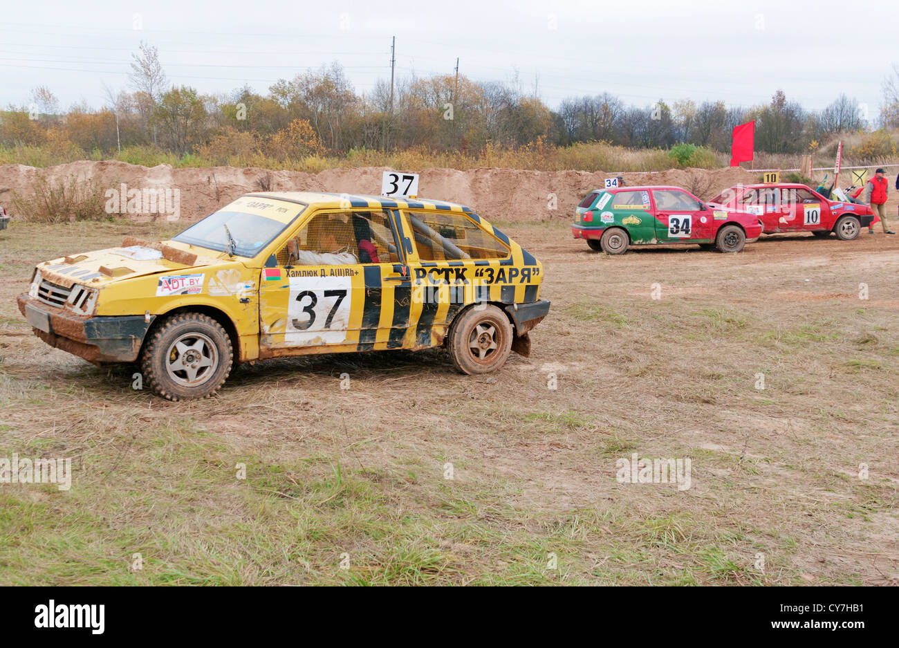 Yellow racing car comes back to camping after test racing. Stock Photo