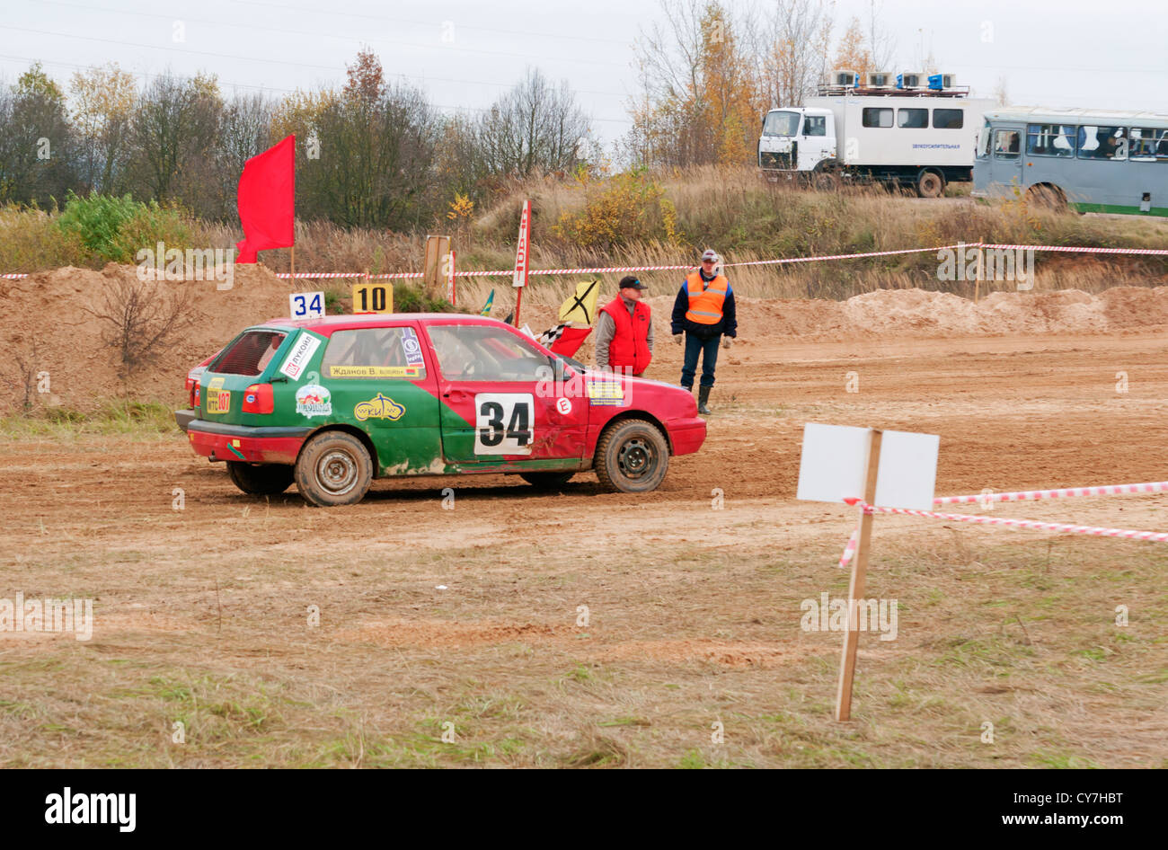 Red-green racing car on test start. Stock Photo