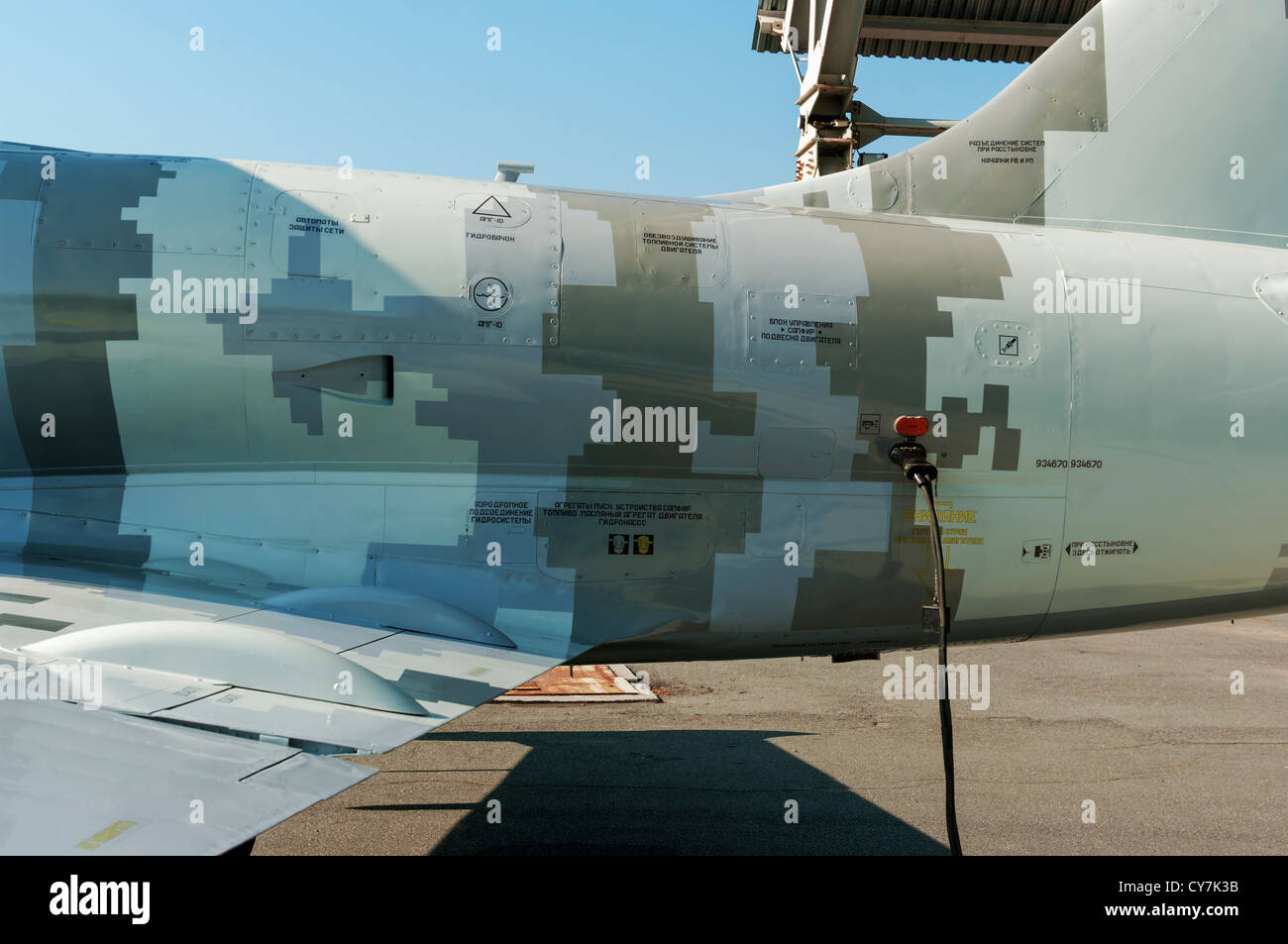 Digital 'pixel' camouflage and stencils on the airplane L-39M1. Stock Photo