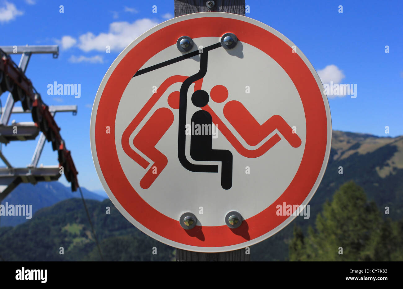 Calm down, stop swinging! - chair lift warning sign Stock Photo