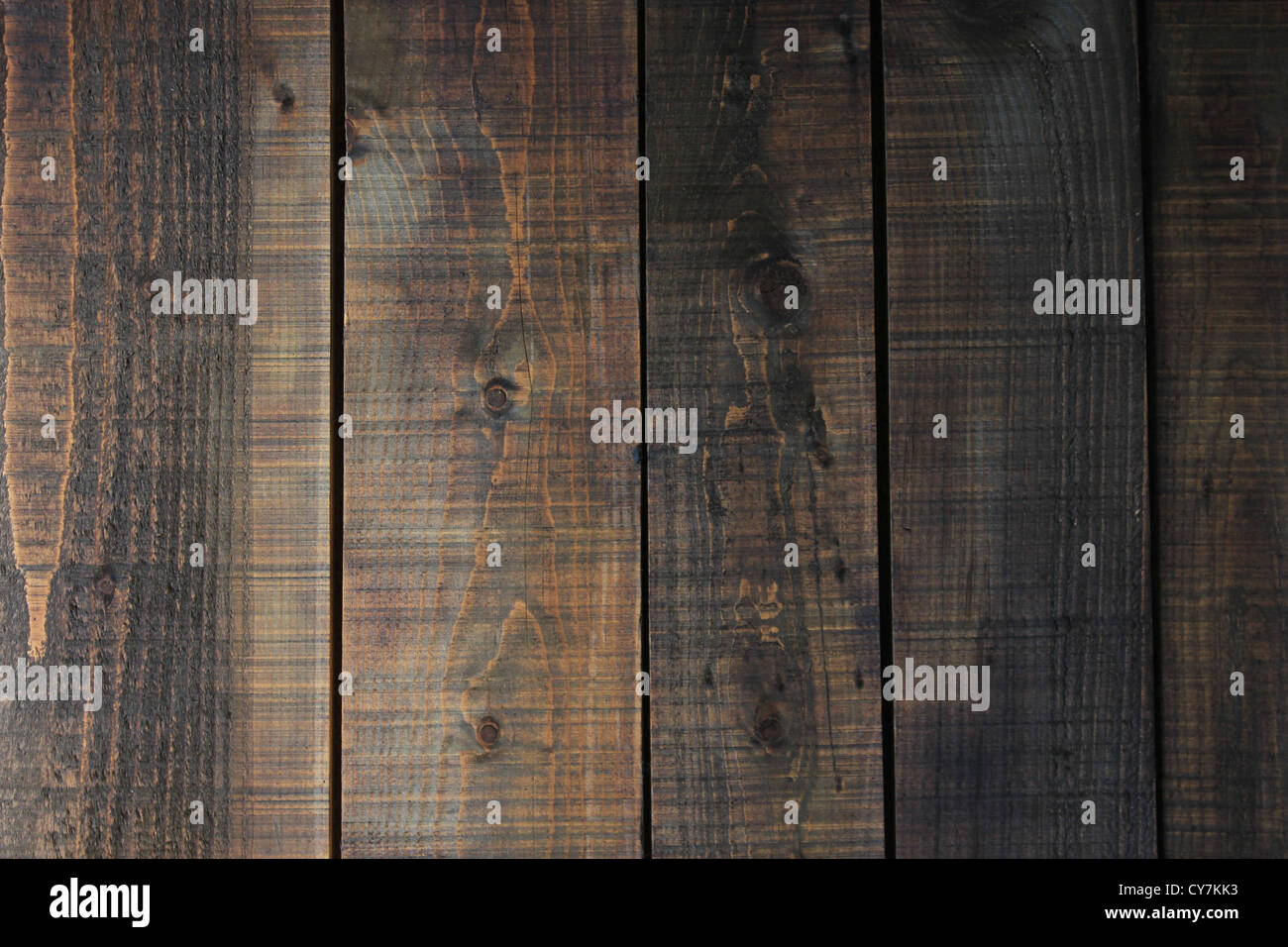 Dark brown wooden planks surface background - vertical lines Stock Photo