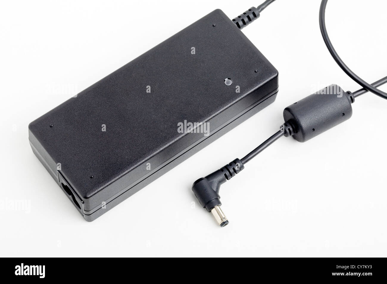 Computer Power Pak A power pack for a laptop isolated on white background Stock Photo - Alamy