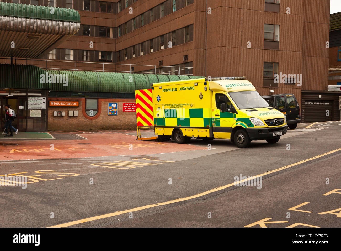 Ambulance unloading patient at A&E emergency casualty department of the Royal Gwent Hospital Newport Wales UK. Stock Photo