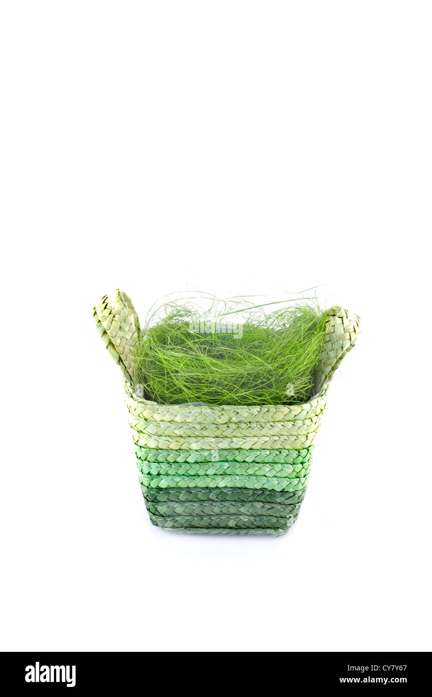 Easter basket with grass isolated on white.Place for text Stock Photo