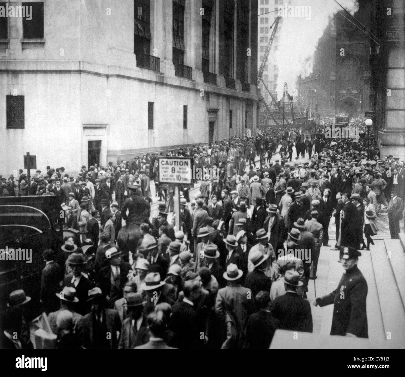 Crowd Outside Stock Exchange Building on Wall Street, New York City, USA, Wall Street Crash of October 24, 1929 Stock Photo