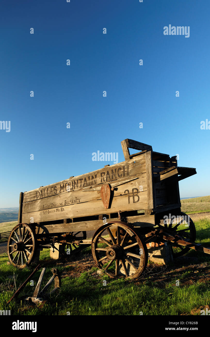 Wood wagon on farm pasture, Columbia Hills State Park, Klickitat County, Washington, USA Stock Photo