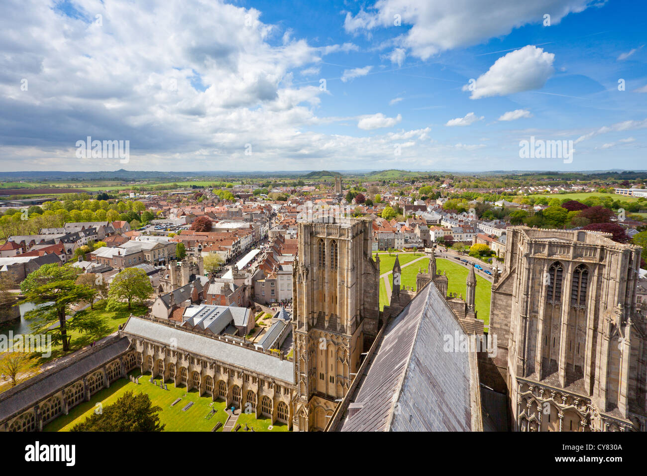 View from the top of the tower of Wells Cathedral across the city of Wells towards Glastonbury Tor, Somerset, England, UK Stock Photo