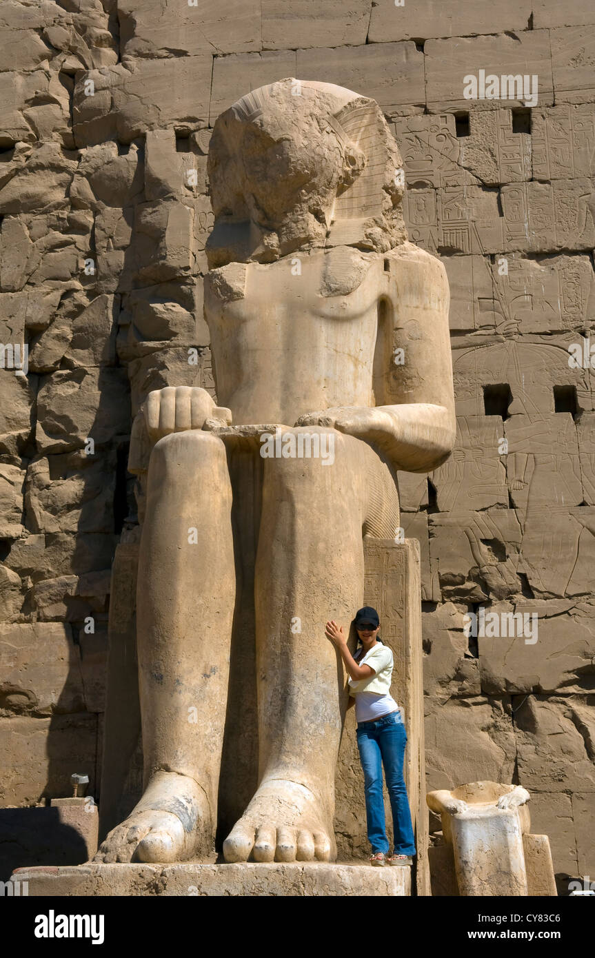 A colossal seated statue representing Amenhotep I, 8th pylon, Precinct of Amun, Temple of Karnak, Luxor, Egypt Stock Photo
