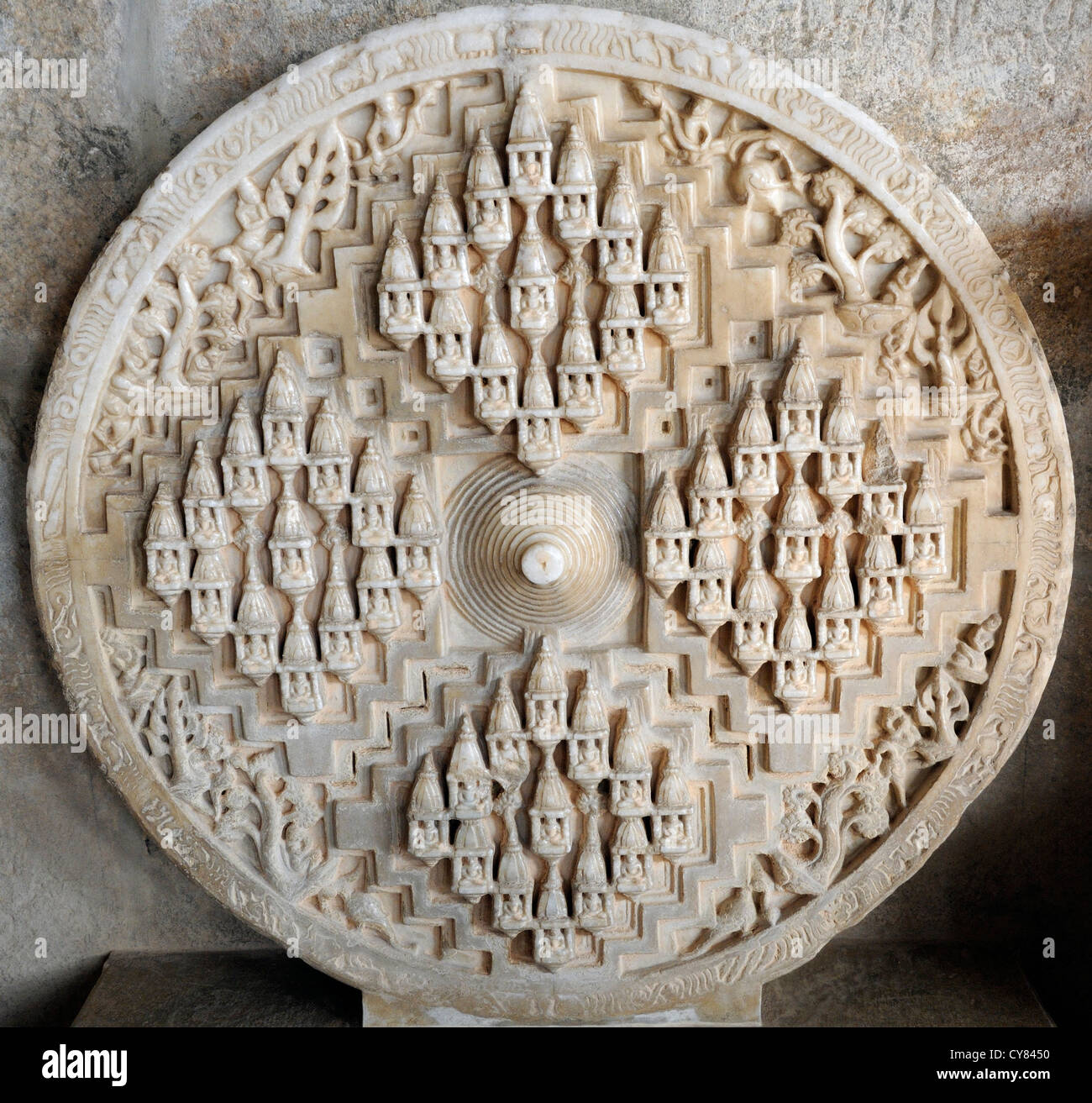 Intricately carved marble stonework at  Chaumukha Temple, the main temple in the complex of Jain temples at Ranakpur. Ranakpur, Stock Photo