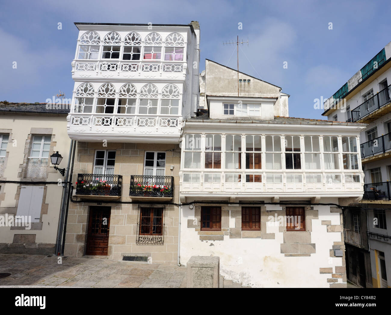 A town house with traditional glazed window balconies, galerías