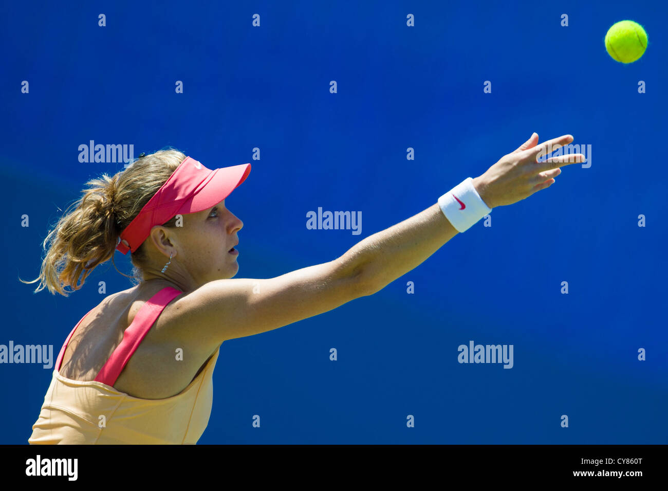 Lucie Safarova in action serving during match. Stock Photo
