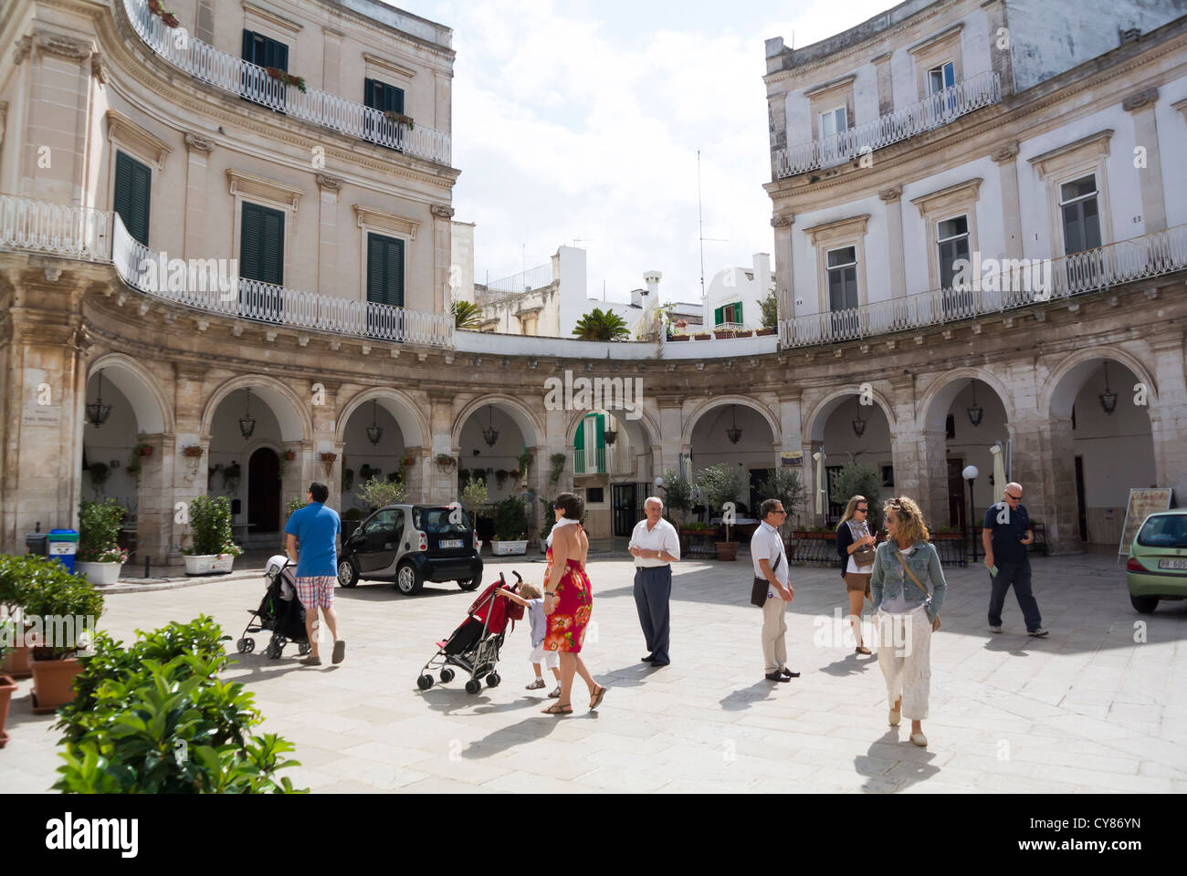 Martina Franca, Puglia, Italy, Plaza with locals Stock Photo