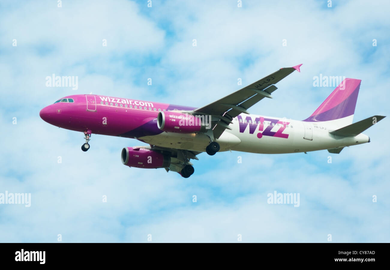 Wizzair airplane flying in the air Stock Photo - Alamy