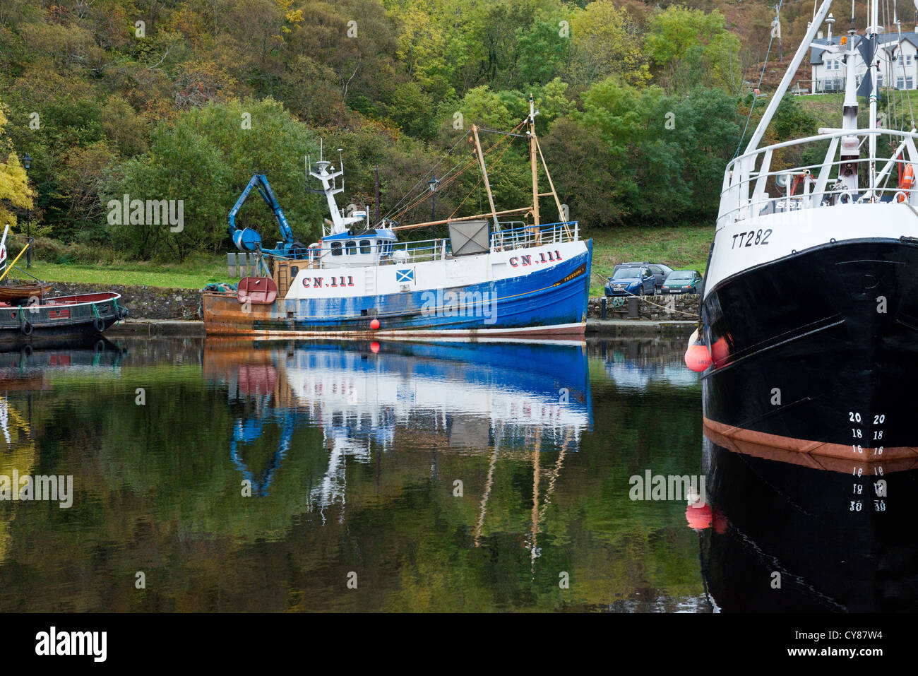 Crinan Canal and small trawler in Argyllshire, Scotland Stock Photo