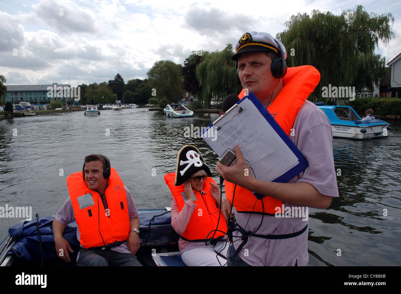 BBC Radio Norfolk presenter Graham Barnard broadcasting live from the  Norfolk Broads at Wroxham, Broads National Park Stock Photo - Alamy