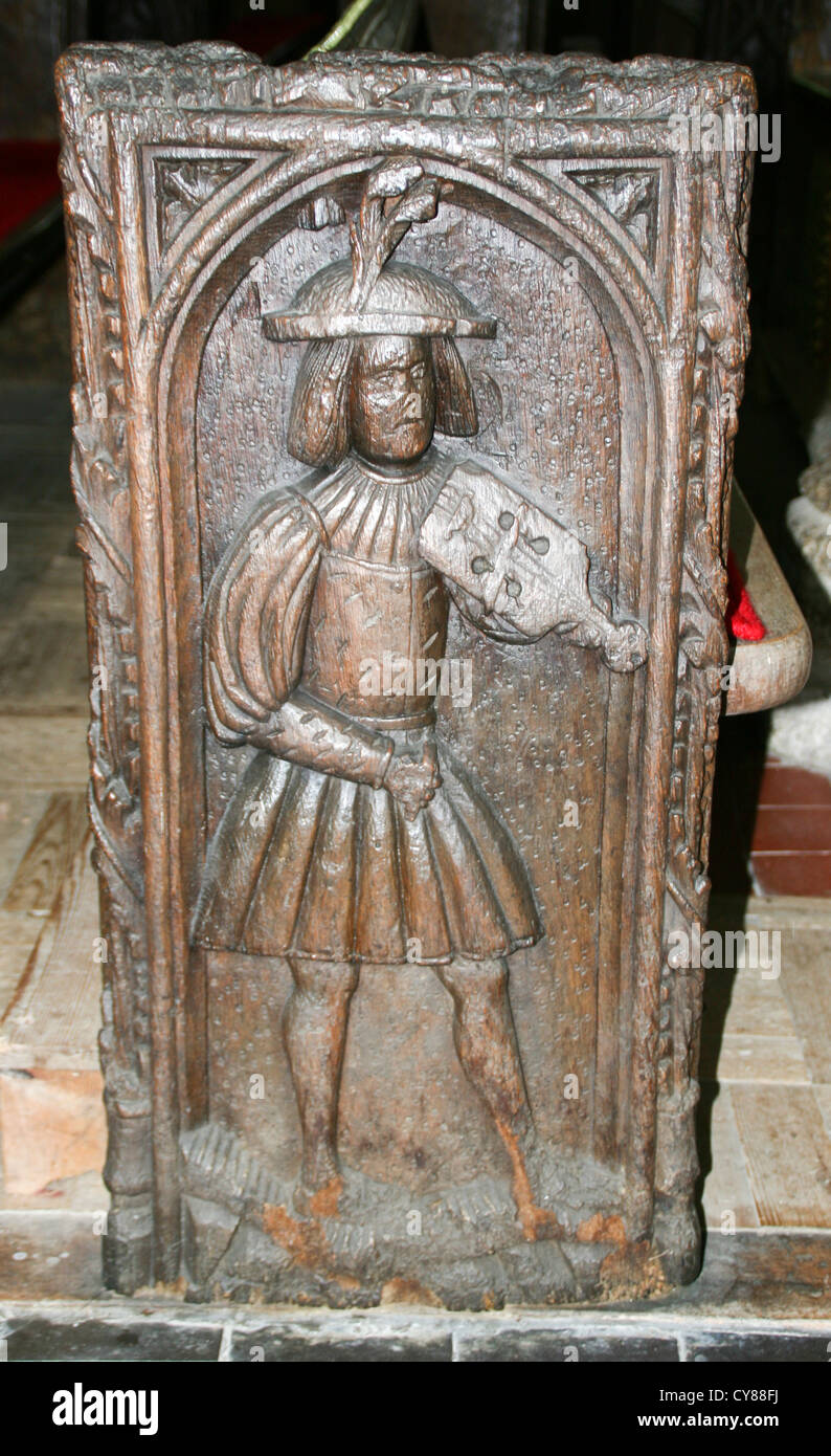 carved benchend musician Altarnun Cornwall England UK Stock Photo