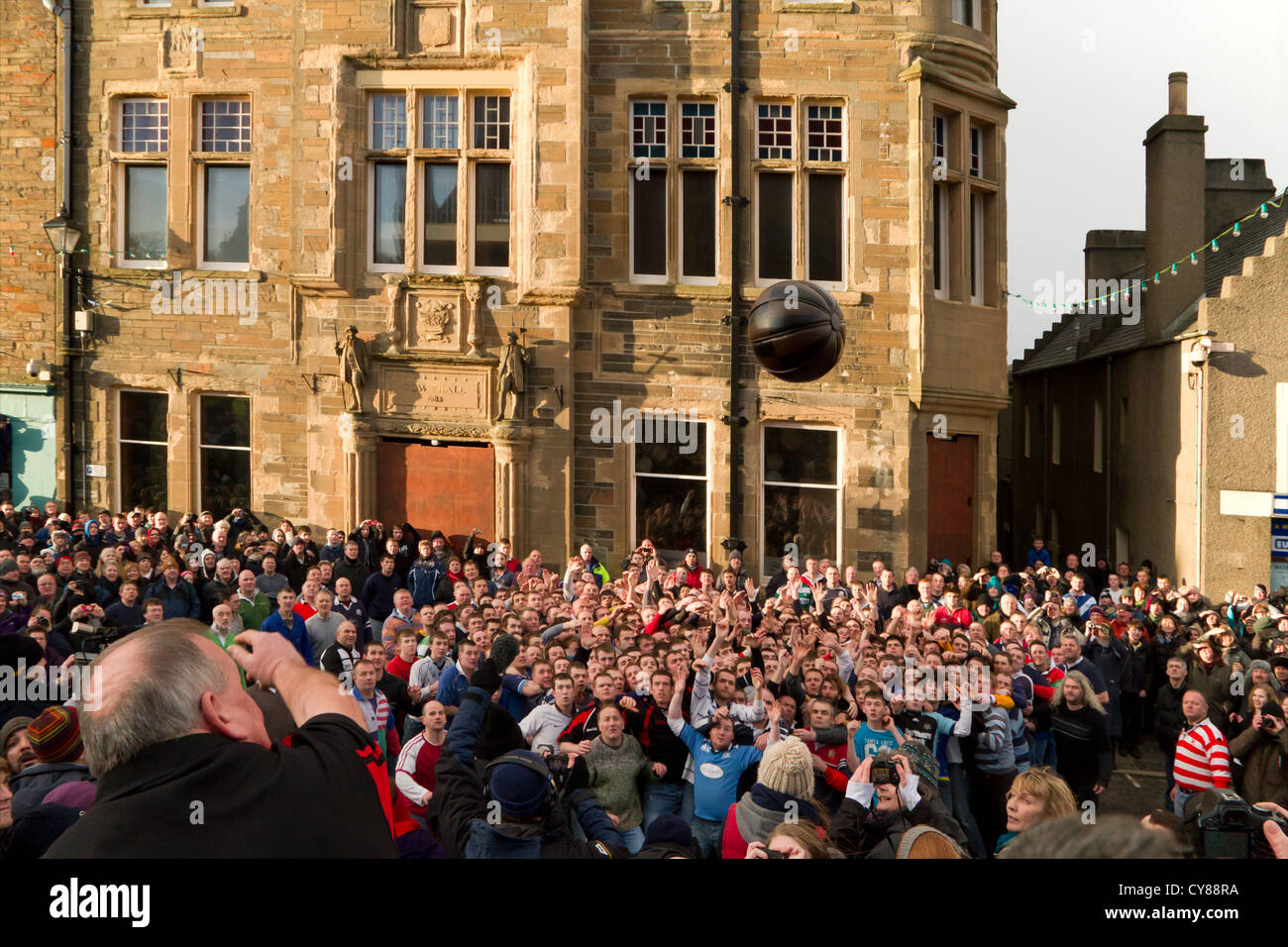 Throwing in the Ba, Kirkwall New Year Ba game Stock Photo