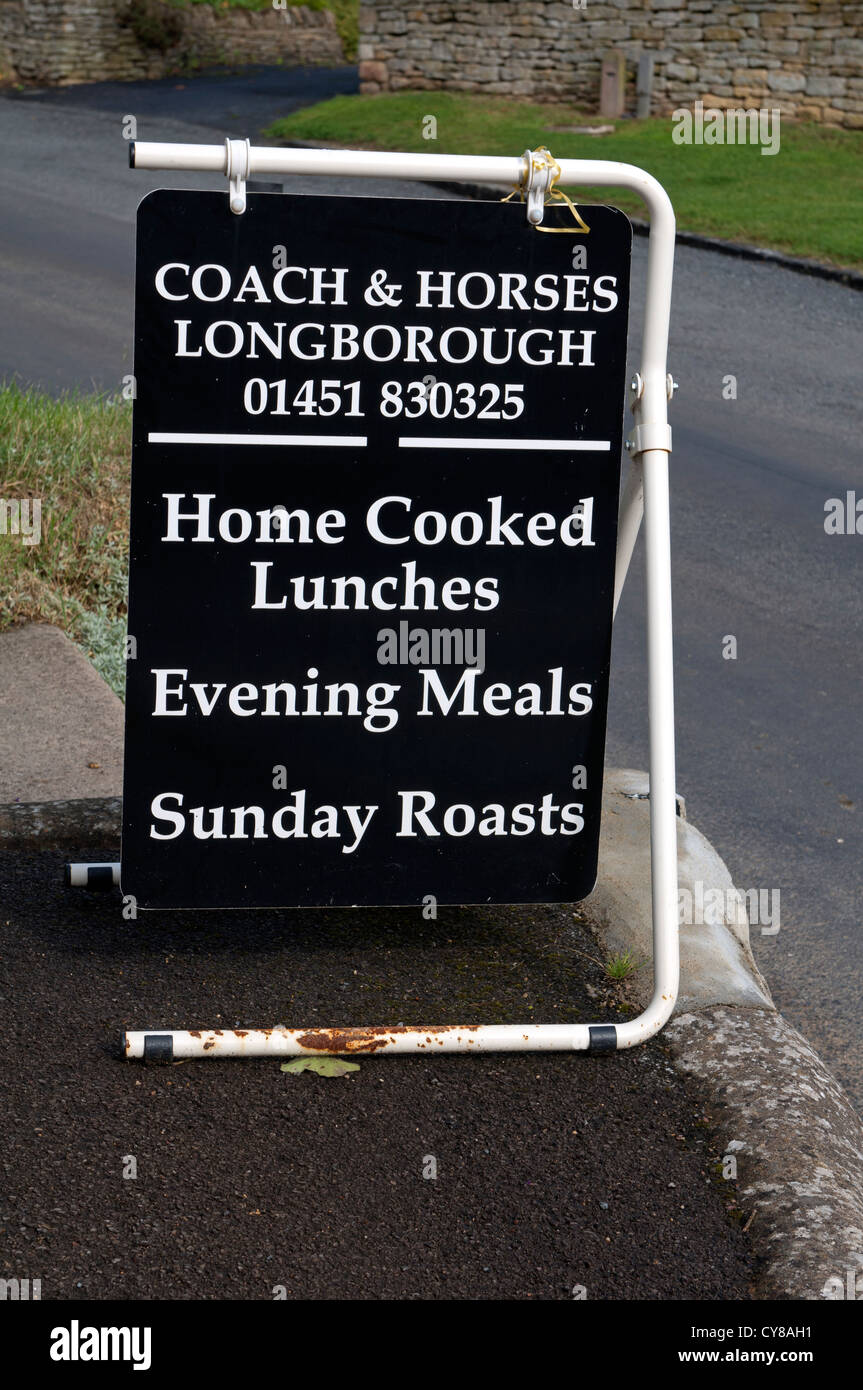 Sign outside the Coach and Horses pub, Longborough, Gloucestershire, UK Stock Photo